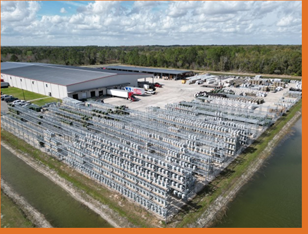 Outdoor rack system and warehouse with trucks