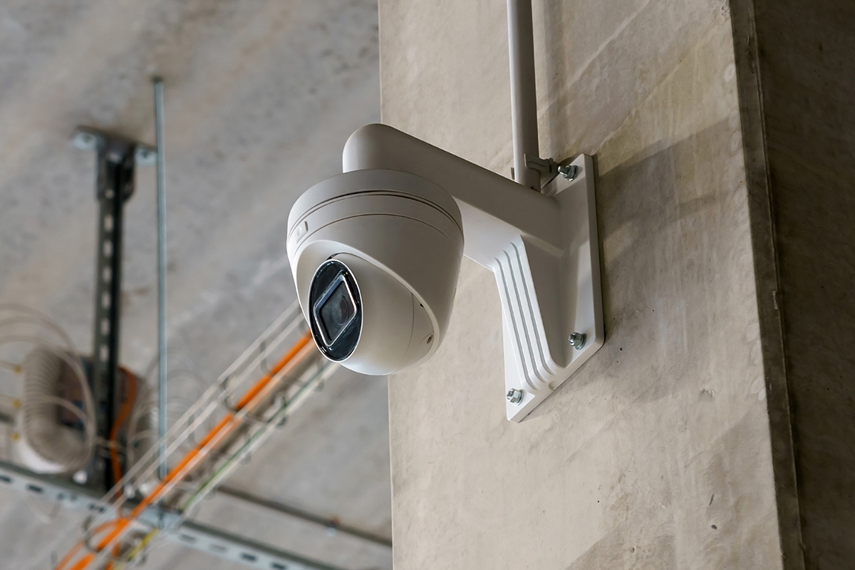 Security camera mounted on concrete post