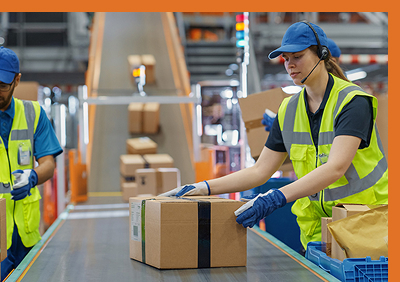 Warehouse employees checking boxes