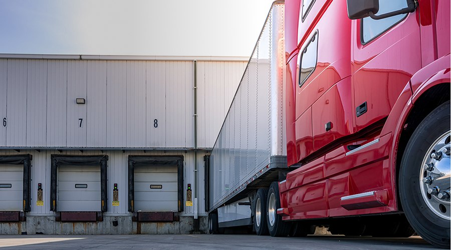 Semi truck and trailer at loading dock