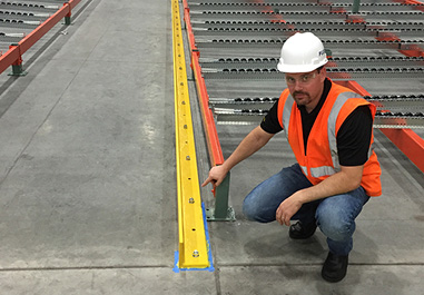 Man in hardhat and high vis vest
