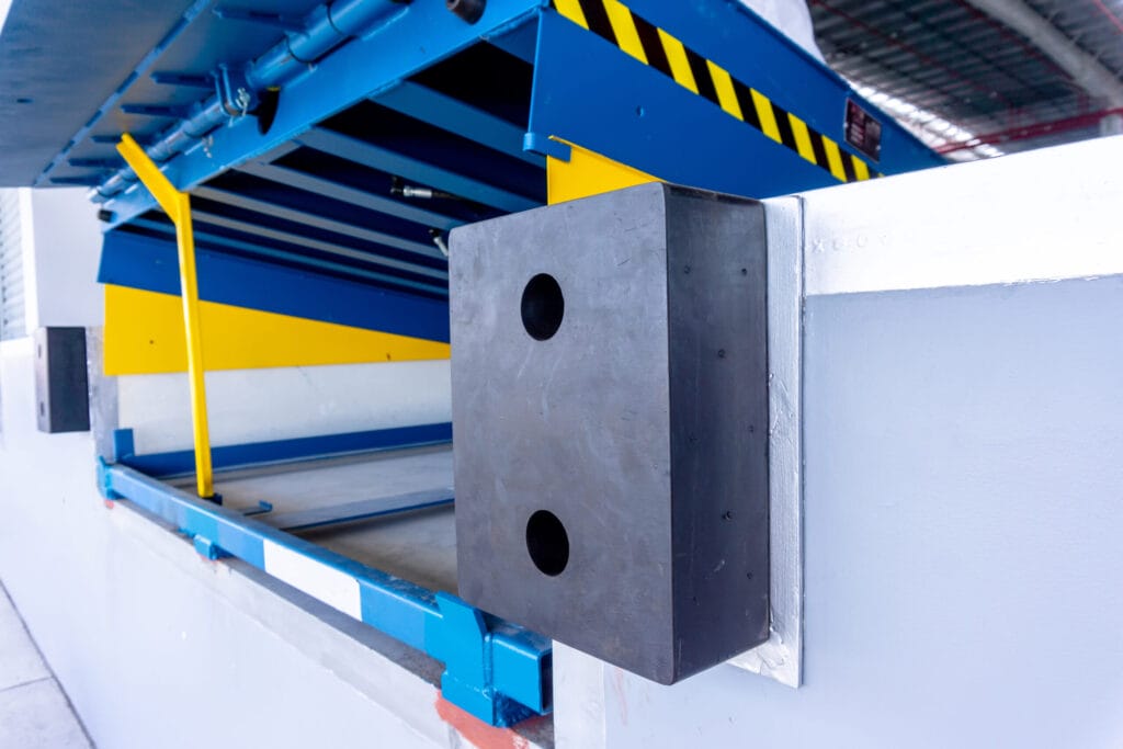 loading dock leveler safety bumpers to keep trucks from harming the dock